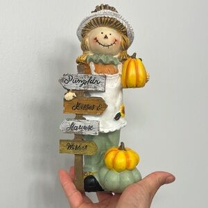 Charming Scarecrow with Pumpkins